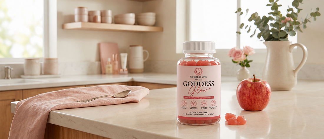 Goddess Glow Apple Cider Vinegar Gummies beside fresh apples on a light kitchen counter.
